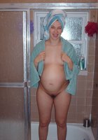 Беременная сняла в комнате корсет и чулки 11 фото Беременная сняла в комнате корсет и чулки 11 фото