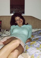 Стройняшка в бирюзовом наряде позирует перед фотографом. 7 фото Стройняшка в бирюзовом наряде позирует перед фотографом. 7 фото