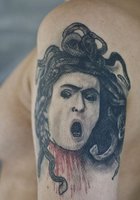 Чертовка с татуировками показывает свои прелести 8 фото Чертовка с татуировками показывает свои прелести 8 фото