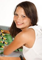 Голая девушка позирует возле футбольного стола и хвастается сиськами 2 фото Голая девушка позирует возле футбольного стола и хвастается сиськами 2 фото